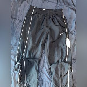 Navy blue Nike track pants